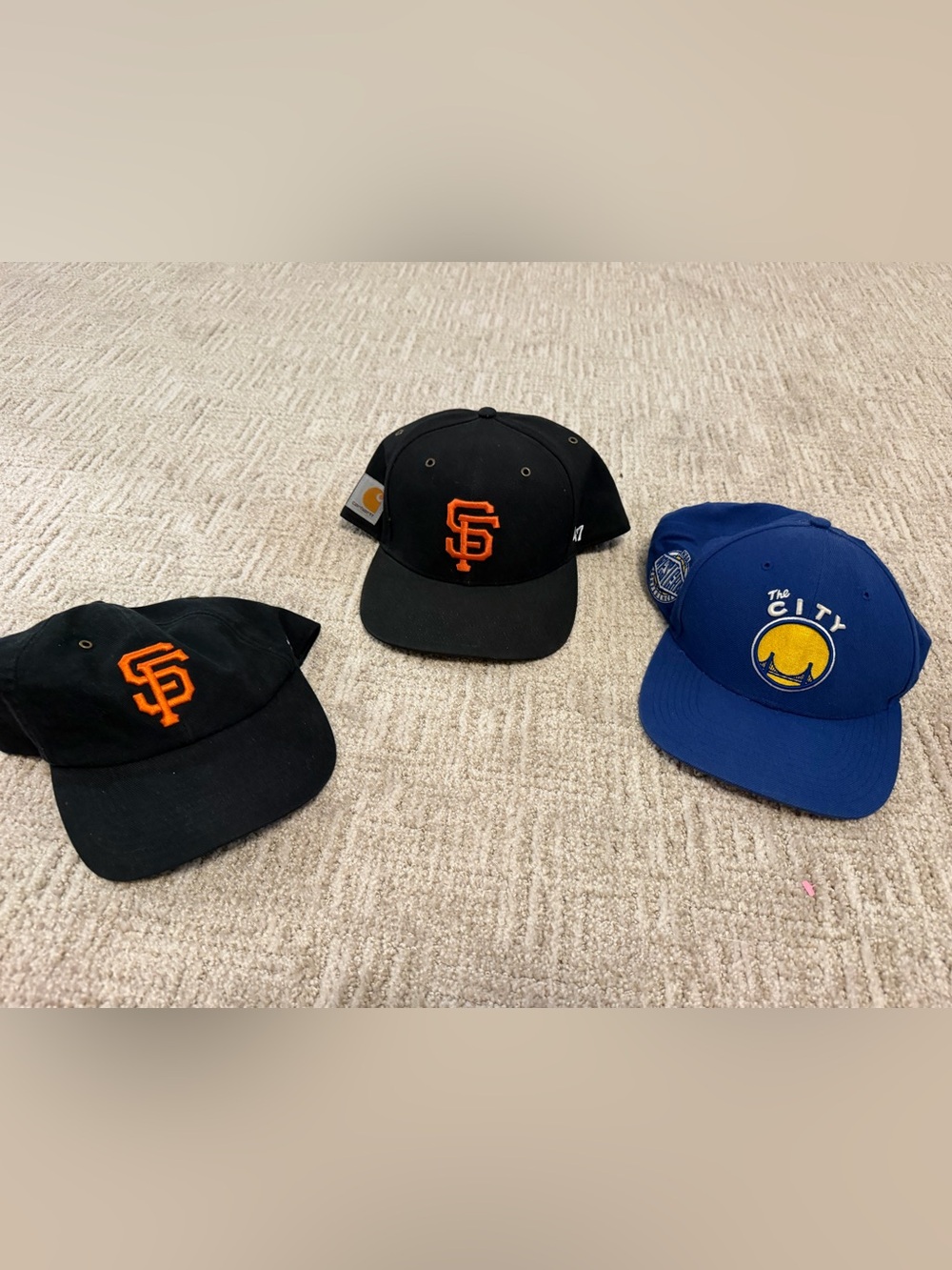 San Francisco giants Carhartt hats and golden state warriors hat.